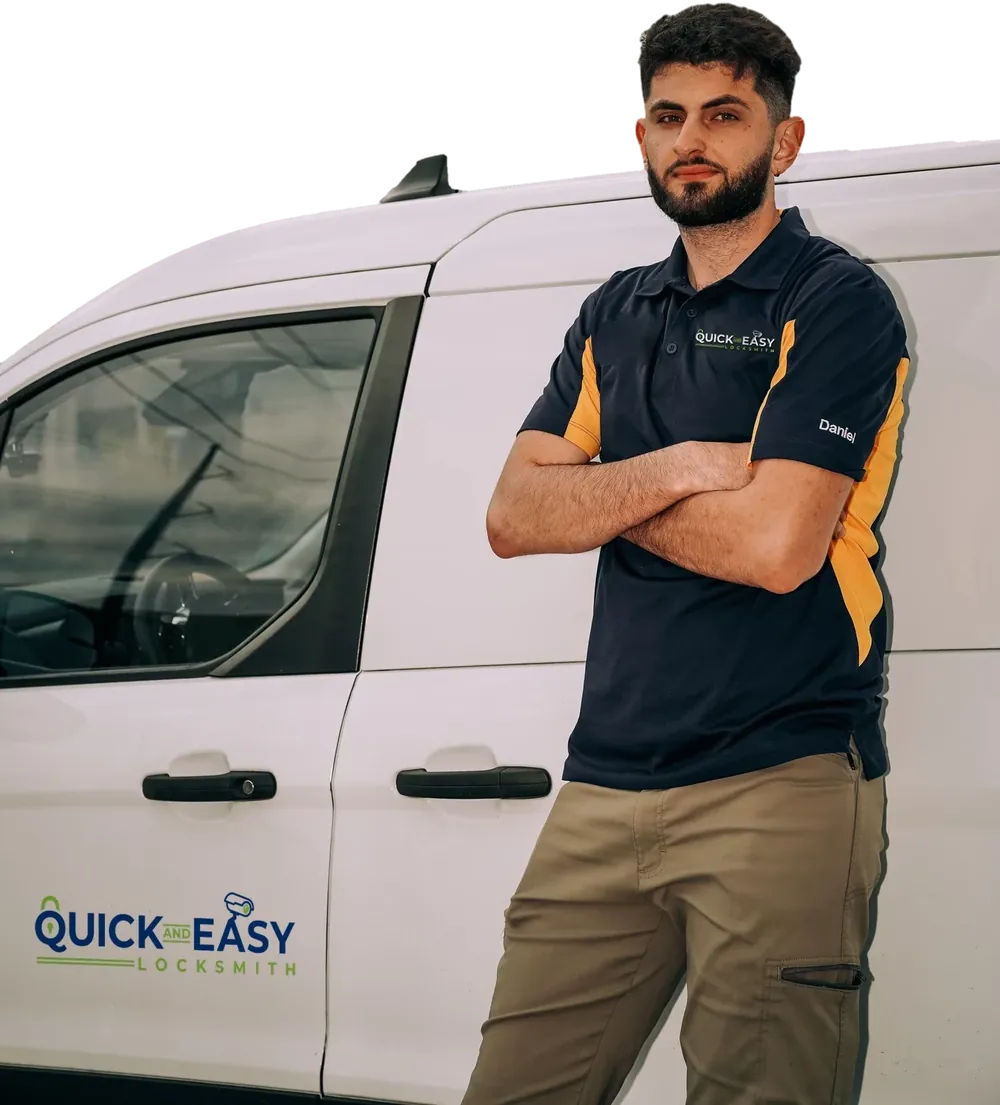 Daniel, owner of Quick and Easy Locksmith, in front of the company van