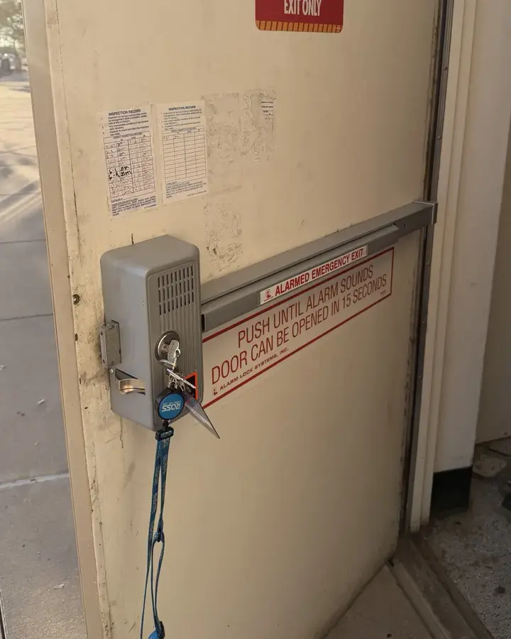 Alarmed panic bar installed on the back exit door of a Ross Dress for Less store in Denton